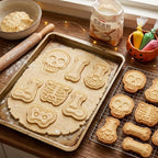 Skeleton-shaped Halloween cookies with decorative icing